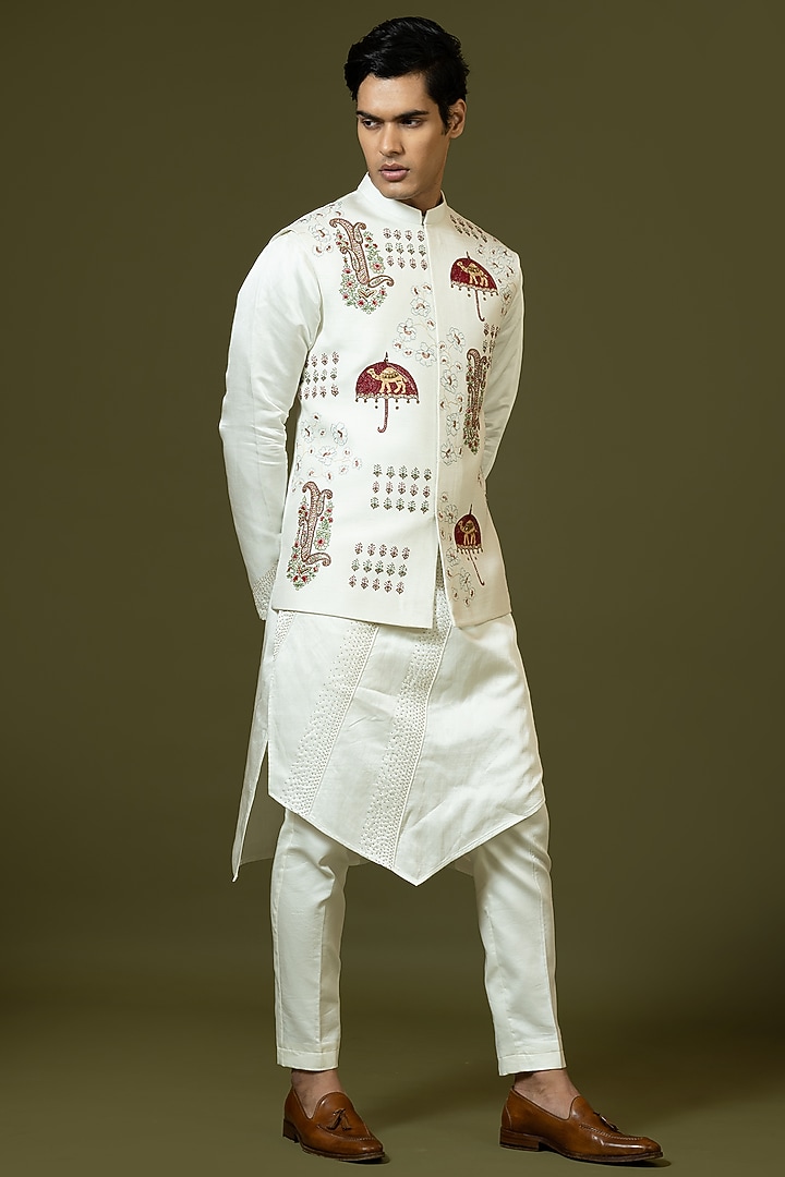 Ivory Linen Satin Kashida Embroidered Bundi Jacket Set by PAARSH at Pernia's Pop Up Shop