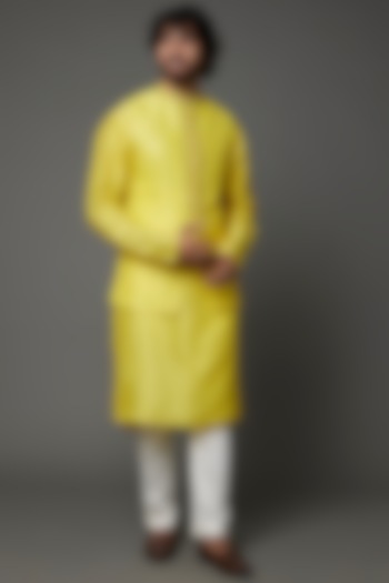Yellow Raw Silk Bundi Jacket With Kurta Set by PAARSH