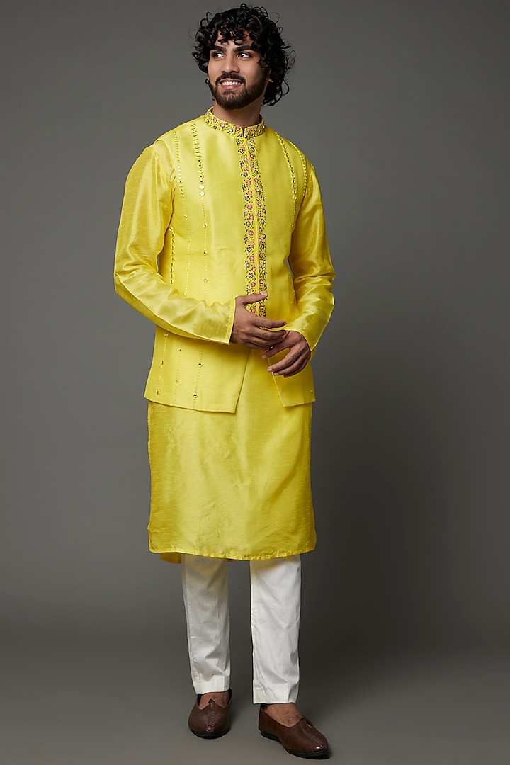 Yellow Raw Silk Bundi Jacket With Kurta Set by PAARSH