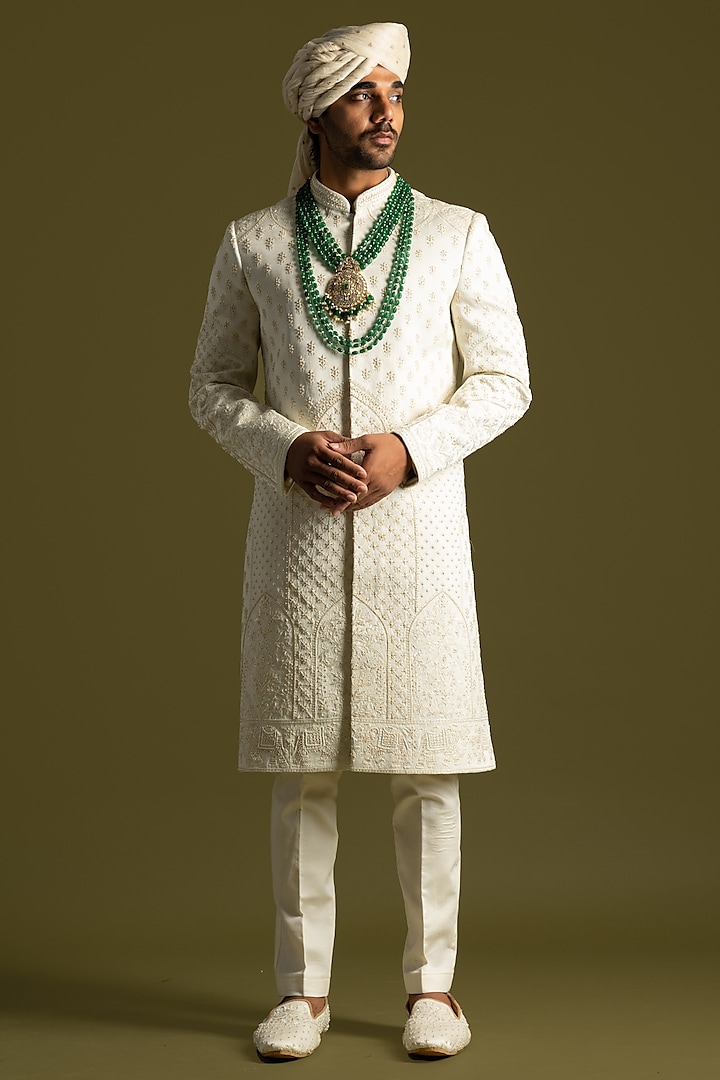 Ivory Linen Satin Thread & Cutdana Embroidered Sherwani Set by PAARSH