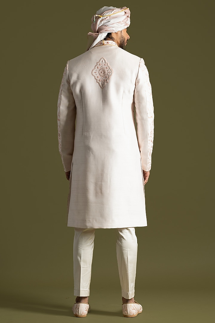 Powder Pink Raw Silk Thread Embroidered Groom Sherwani Set by PAARSH at Pernia's Pop Up Shop