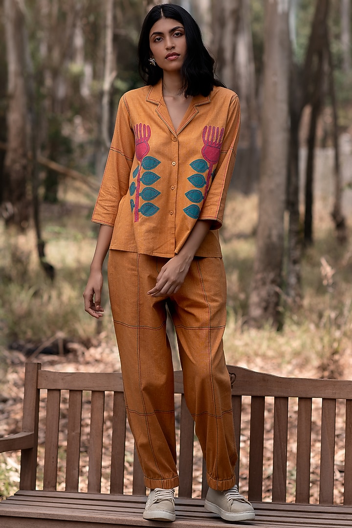 Mustard Muslin Cotton Jogger Pants by Priya Agarwal at Pernia's Pop Up Shop