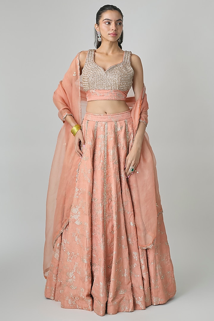 Peach Silver Jacquard Hand Embroidered Wedding Lehenga Set by Paulmi & Harsh at Pernia's Pop Up Shop