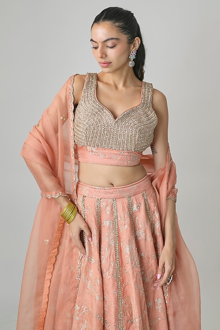 Peach Silver Jacquard Hand Embroidered Wedding Lehenga Set by Paulmi & Harsh at Pernia's Pop Up Shop