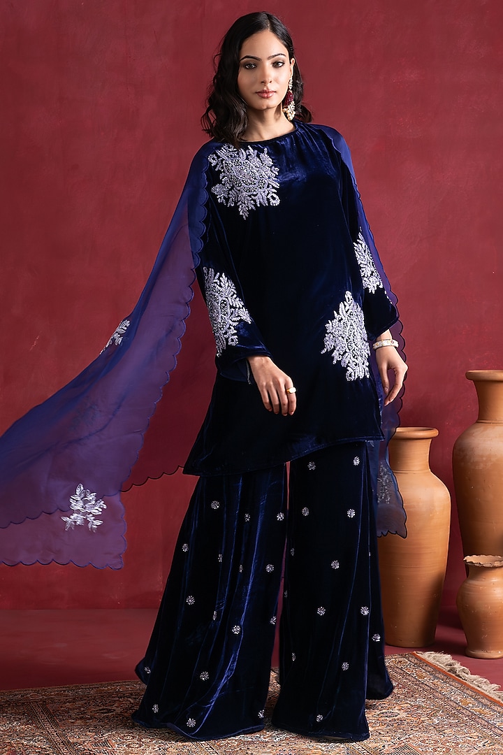 Blue Silk Velvet Embroidered Sharara Set by Pairaahan