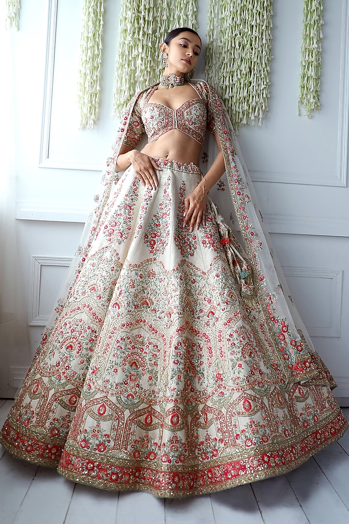 Ivory Raw Silk Embroidered Bridal Lehenga Set by Pallavi Poddar (India) at Pernia's Pop Up Shop