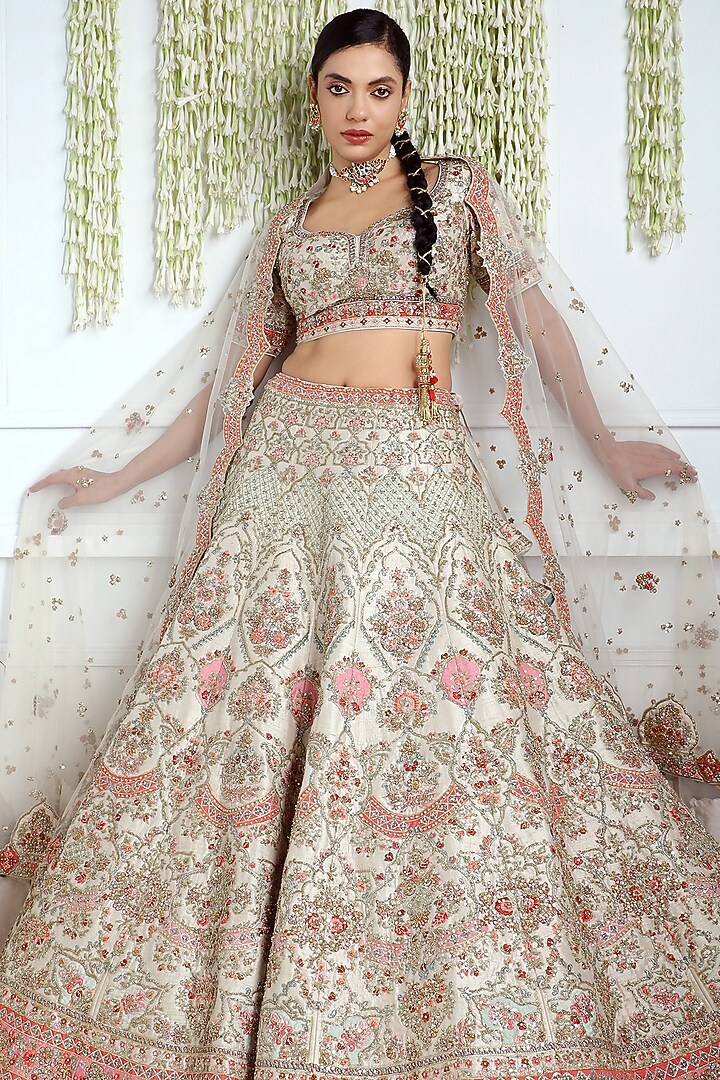 Ivory Raw Silk Embroidered Bridal Lehenga Set by Pallavi Poddar (India) at Pernia's Pop Up Shop