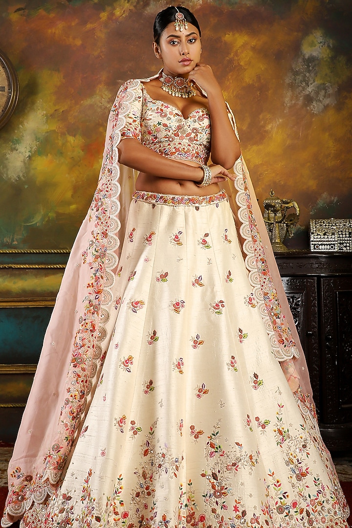 Ivory Raw Silk Embroidered Bridal Lehenga Set by Pallavi Poddar (India) at Pernia's Pop Up Shop