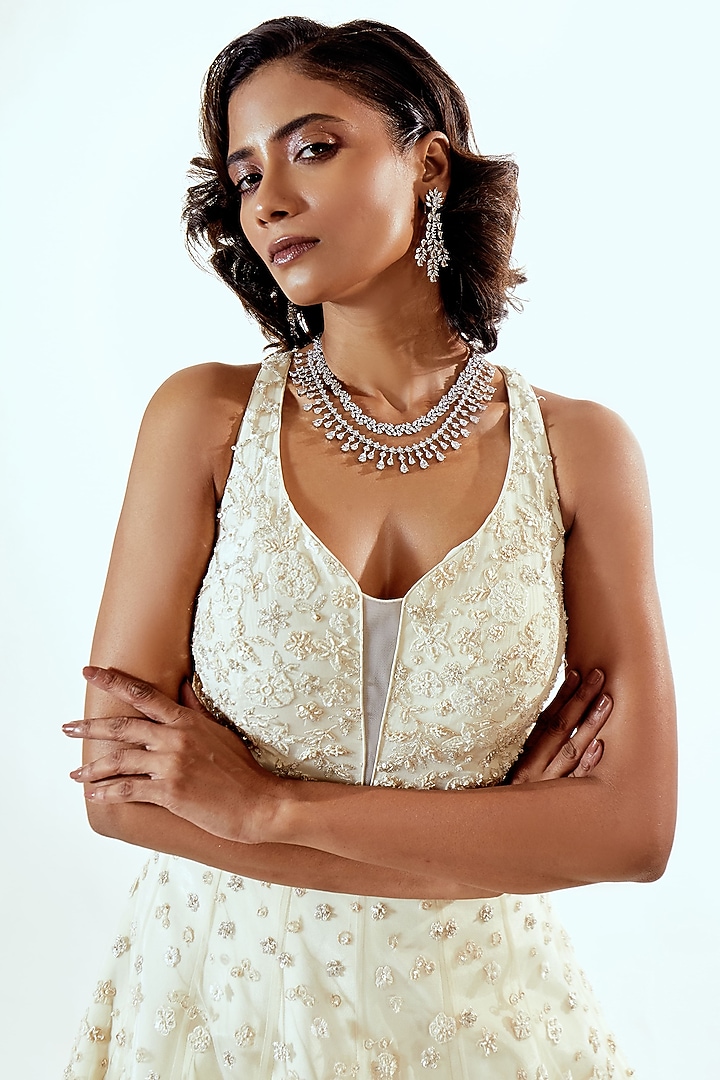 Ivory Net Floral & Pearl Hand Embroidered Draped Bridal Gown by Pallavi Poddar (India) at Pernia's Pop Up Shop