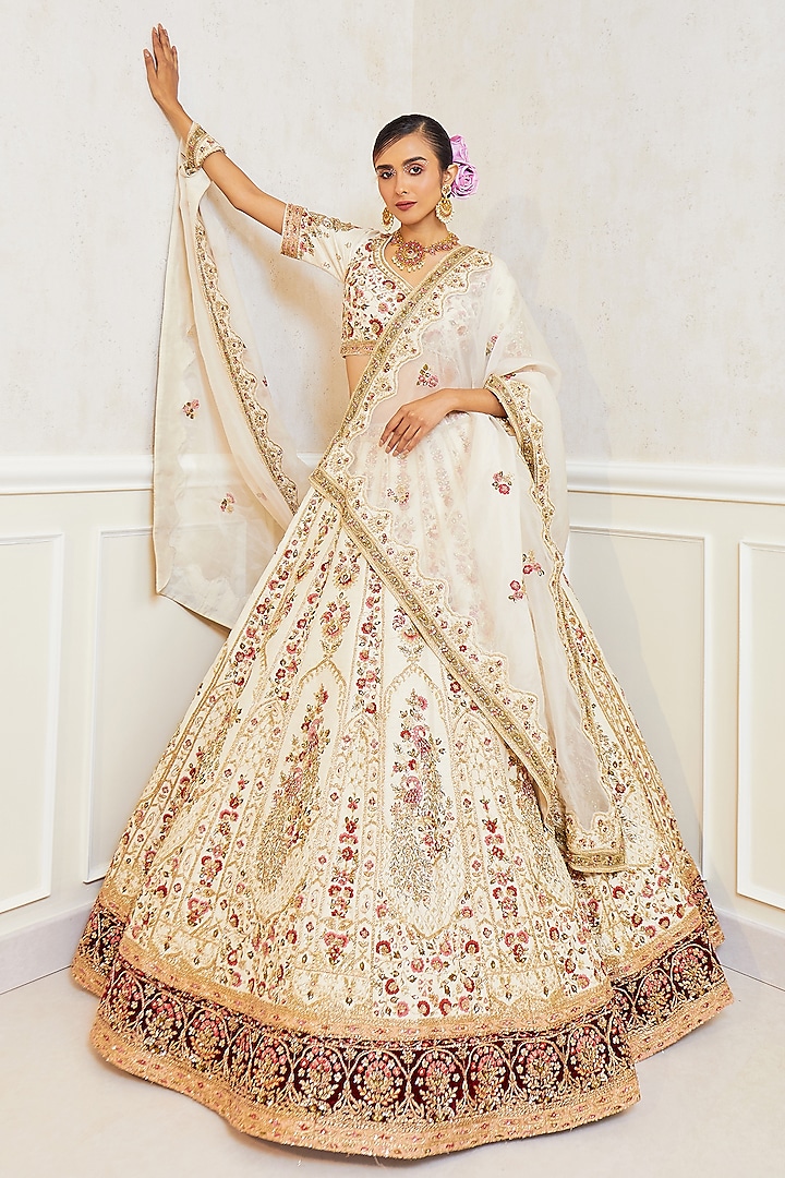 Ivory Raw Silk Embroidered Bridal Lehenga Set by Pallavi Poddar (India) at Pernia's Pop Up Shop