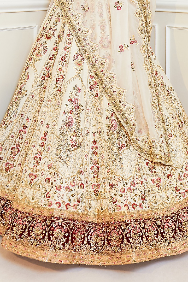 Ivory Raw Silk Embroidered Bridal Lehenga Set by Pallavi Poddar (India) at Pernia's Pop Up Shop