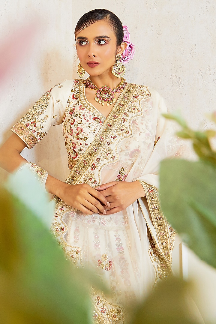 Ivory Raw Silk Embroidered Bridal Lehenga Set by Pallavi Poddar (India) at Pernia's Pop Up Shop