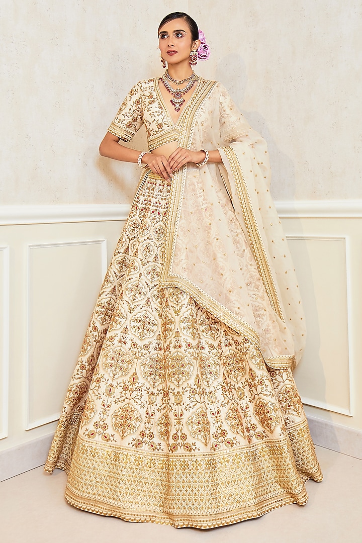 Ivory Raw Silk Zardosi Hand Work Bridal Lehenga Set by Pallavi Poddar (India) at Pernia's Pop Up Shop