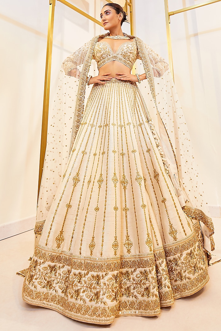 Beige Raw Silk Hand Embellished Bridal Lehenga Set by Pallavi Poddar (India) at Pernia's Pop Up Shop