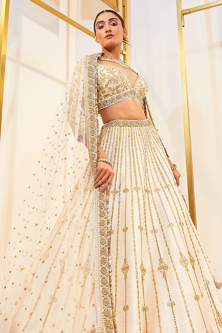 Beige Raw Silk Hand Embellished Bridal Lehenga Set by Pallavi Poddar (India) at Pernia's Pop Up Shop