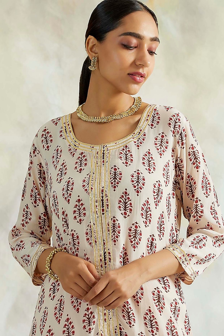 Beige Block Printed High-Low Kurta Set by Palak & Mehak at Pernia's Pop Up Shop