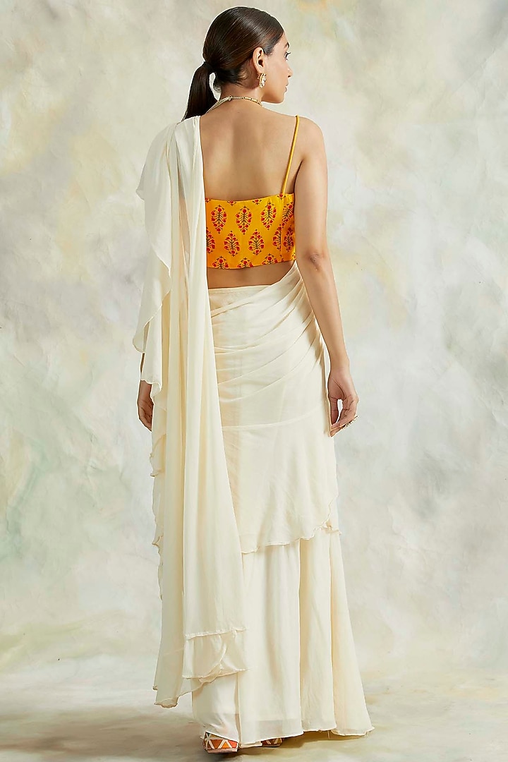Ivory Pre-Stithced Draped Party Wear Saree Set by Palak & Mehak at Pernia's Pop Up Shop