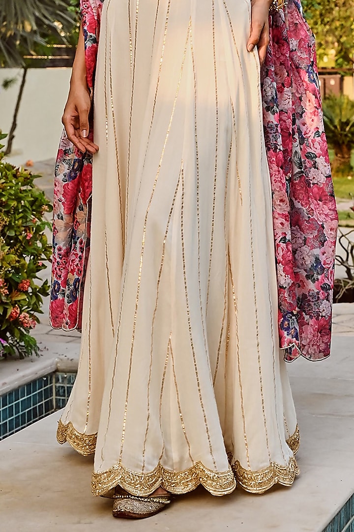 Ivory Rayon Crepe Lurex Lehenga Set by Palak & Mehak at Pernia's Pop Up Shop
