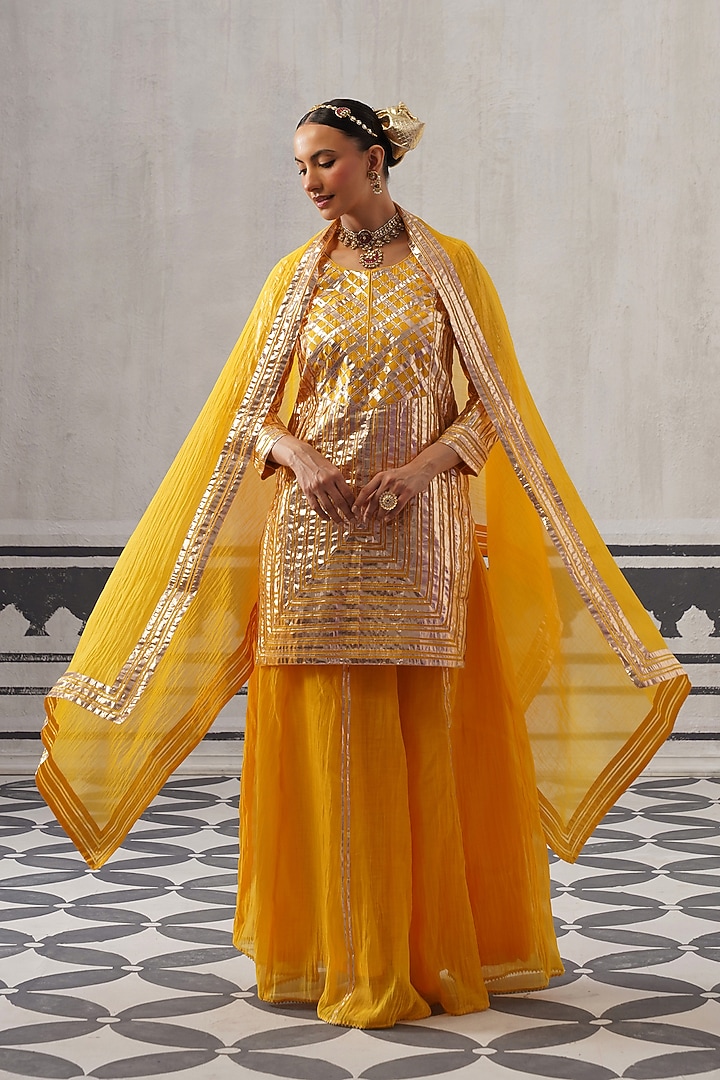 Yellow Mulmul Chanderi Gota Embroidered Kurta Set by Palak & Mehak at Pernia's Pop Up Shop