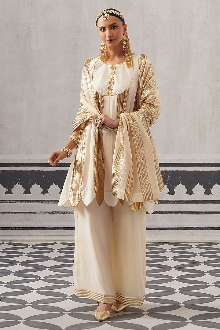 Cream Mulmul Chanderi Gota Embellished Kurta Set by Palak & Mehak at Pernia's Pop Up Shop