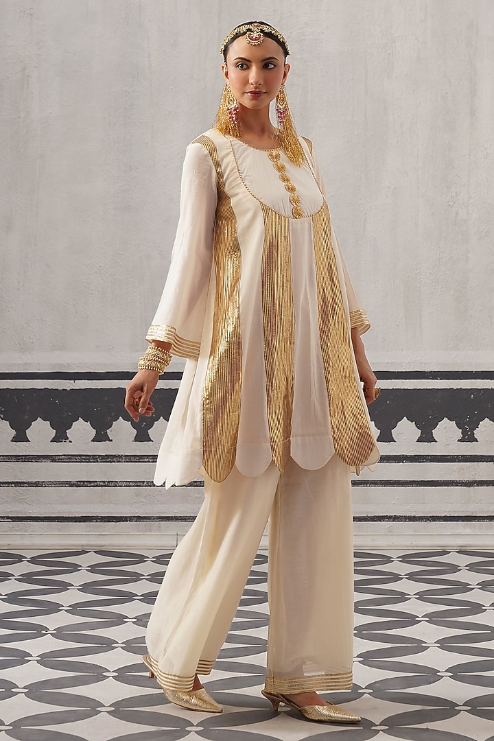 Cream Mulmul Chanderi Gota Embellished Kurta Set by Palak & Mehak at Pernia's Pop Up Shop