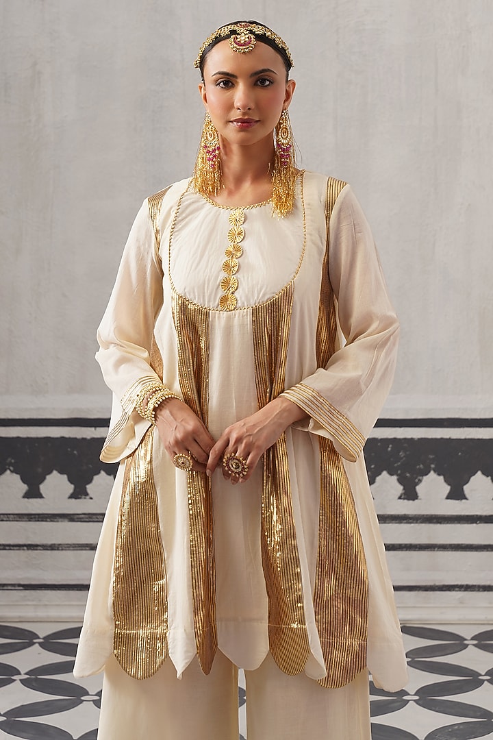 Cream Mulmul Chanderi Gota Embellished Kurta Set by Palak & Mehak at Pernia's Pop Up Shop