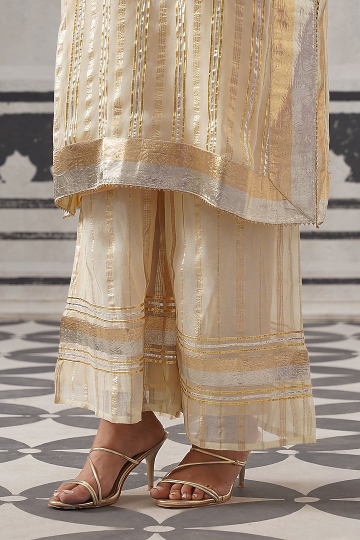 Cream Mulmul Chanderi Gota Embellished Kurta Set by Palak & Mehak at Pernia's Pop Up Shop