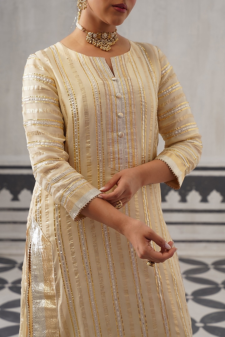 Cream Mulmul Chanderi Gota Embellished Kurta Set by Palak & Mehak at Pernia's Pop Up Shop