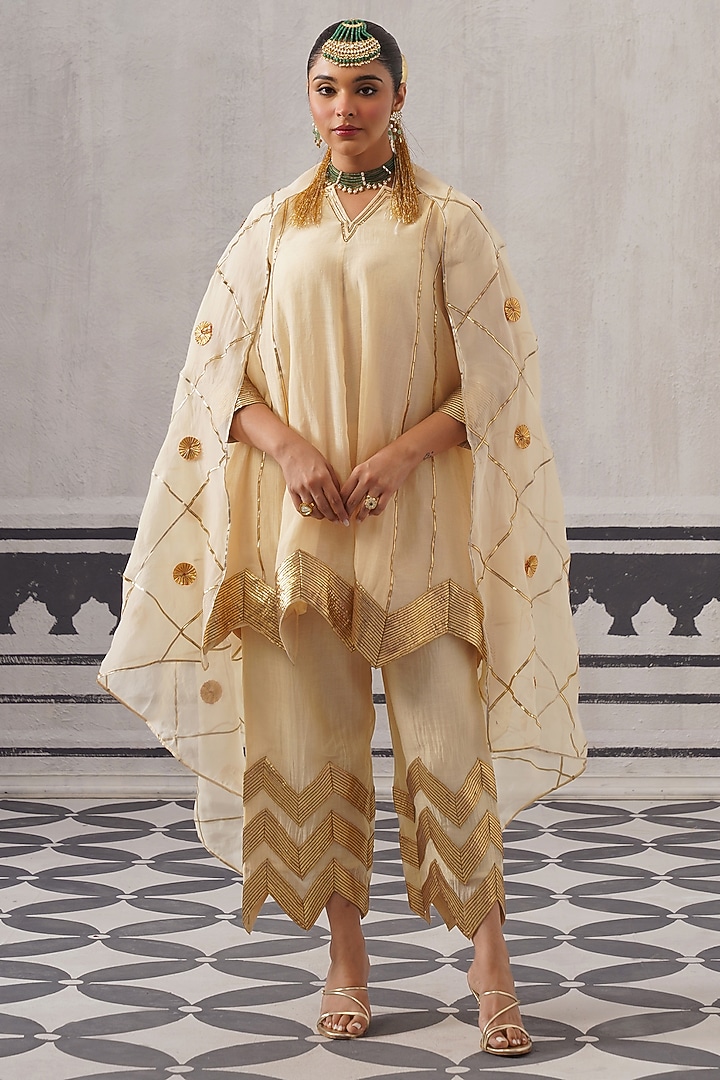 Cream Mulmul Chanderi Gota Embellished Kurta Set by Palak & Mehak at Pernia's Pop Up Shop