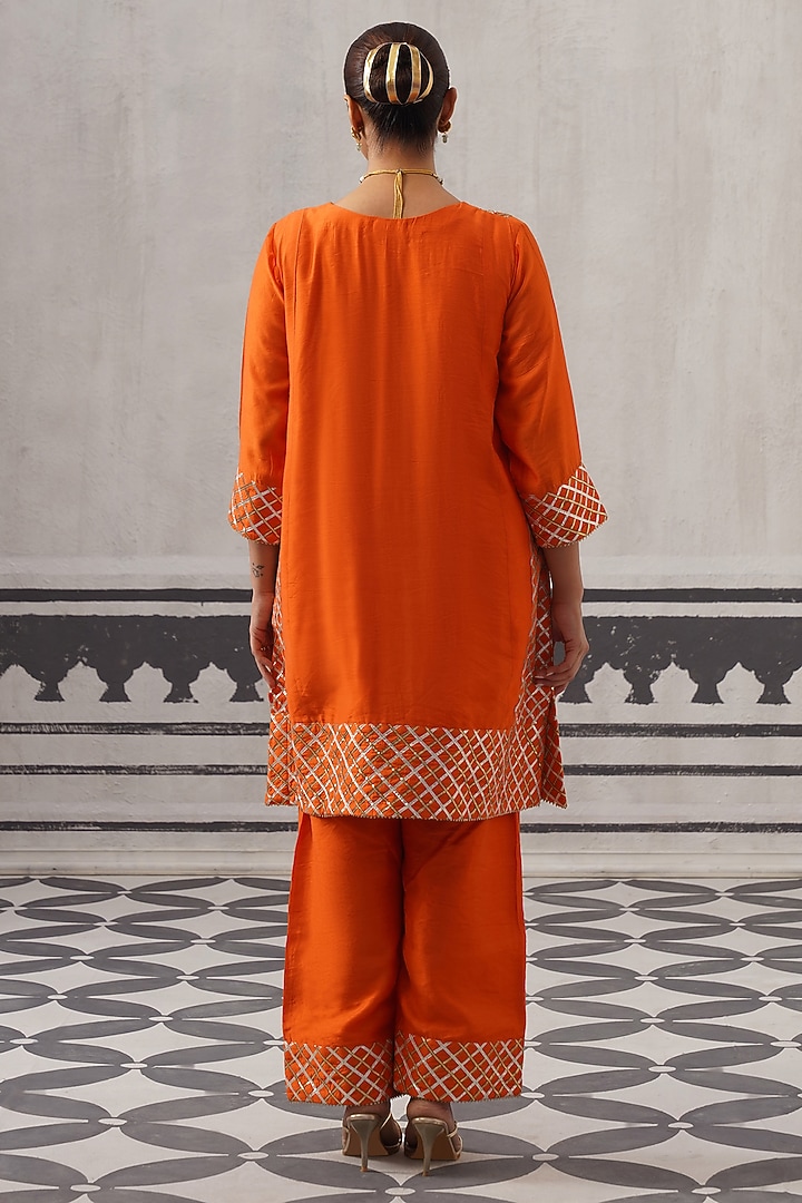 Orange Mulmul Chanderi Gota Embellished Kurta Set by Palak & Mehak at Pernia's Pop Up Shop