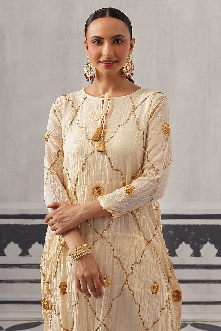 Cream Cotton Mulmul Gota Embellished Kurta Set by Palak & Mehak at Pernia's Pop Up Shop