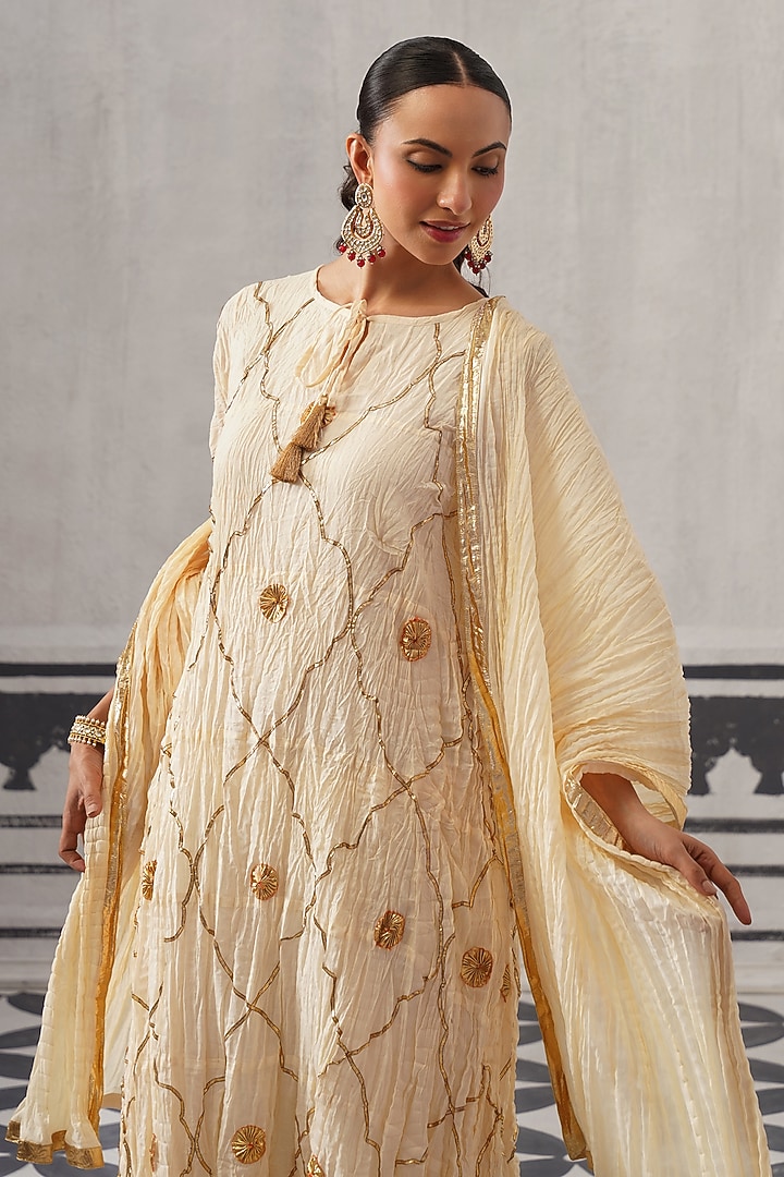 Cream Cotton Mulmul Gota Embellished Kurta Set by Palak & Mehak at Pernia's Pop Up Shop