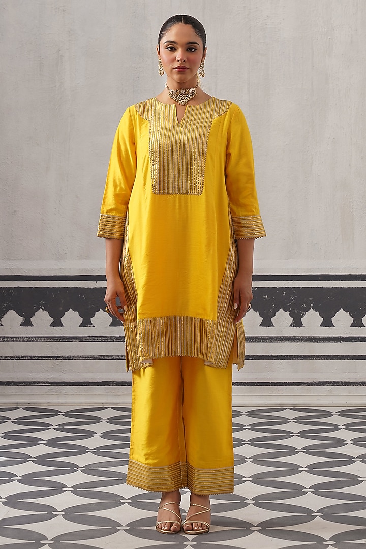 Yellow Mulmul Chanderi Gota Embellished Kurta Set by Palak & Mehak at Pernia's Pop Up Shop