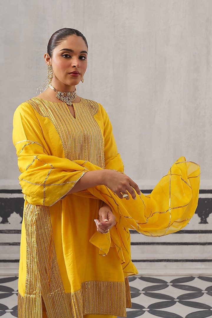 Yellow Mulmul Chanderi Gota Embellished Kurta Set by Palak & Mehak at Pernia's Pop Up Shop