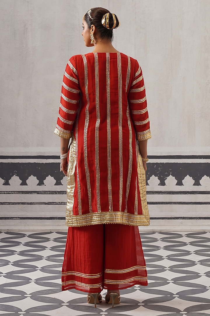 Red Mulmul Chanderi Gota Embellished Kurta Set by Palak & Mehak at Pernia's Pop Up Shop