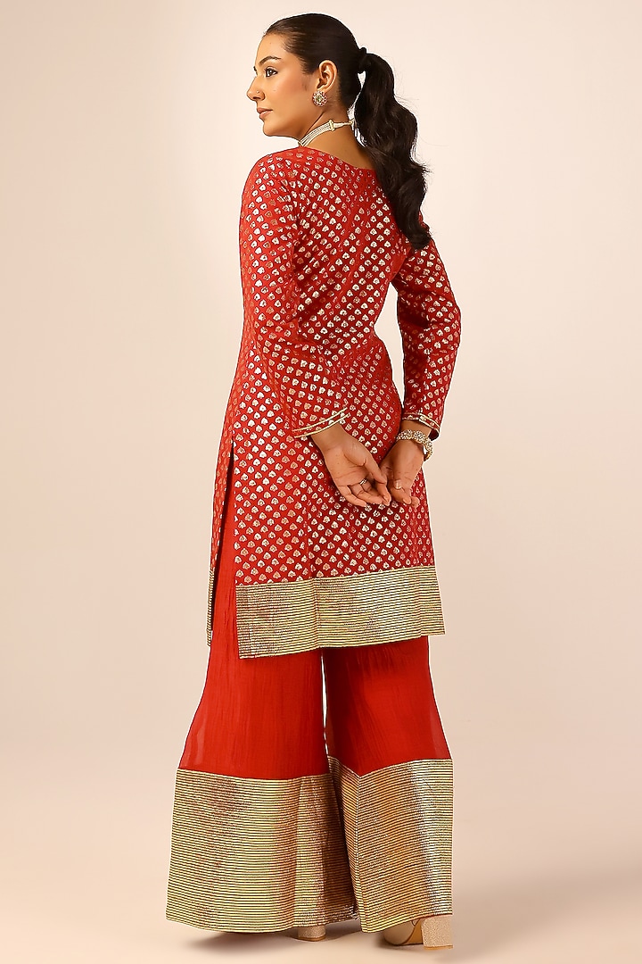 Red Banarasi Chanderi Gold Gota Embroidered Party Wear Sharara Set by Palak & Mehak at Pernia's Pop Up Shop