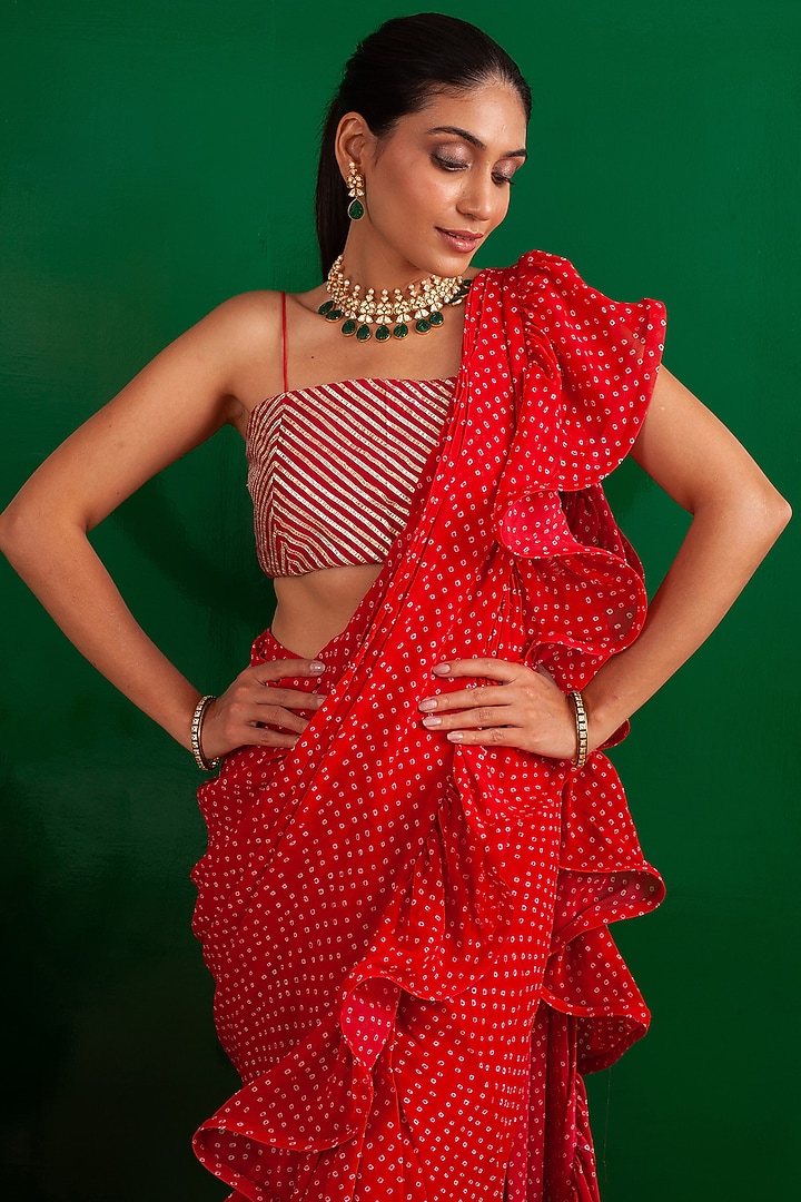 Red Georgette Bandhani Printed Draped Party Wear Saree Set by Palak & Mehak at Pernia's Pop Up Shop