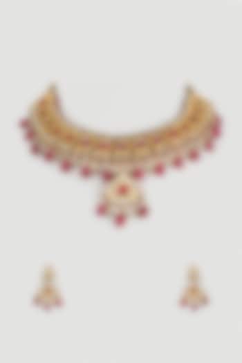 Gold Finish Necklace Set With Red Beads by Payal Mittle