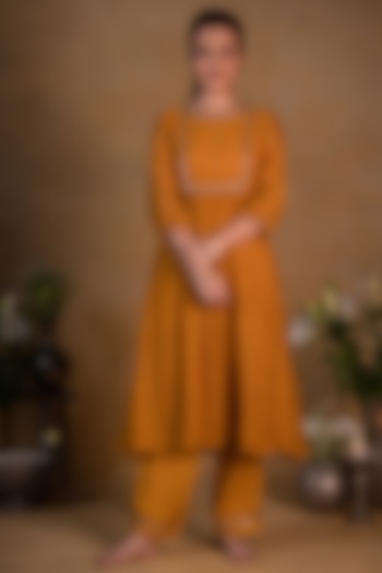 Mustard Embroidered Pants by Pants and Pajamas at Pernia's Pop Up Shop