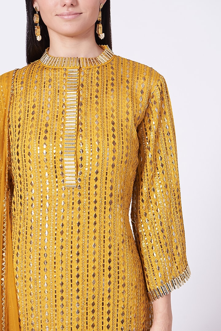 Mustard Foil Embroidered Kurta Set by Poshak apparels at Pernia's Pop Up Shop