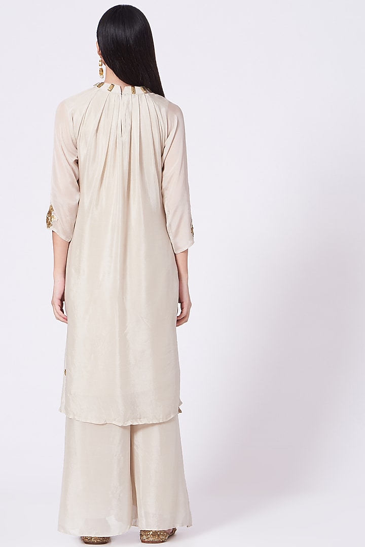 Ivory Sequins Embroidered Long Kurta Set by Poshak apparels at Pernia's Pop Up Shop