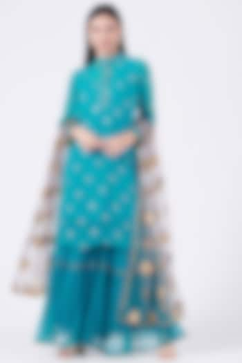 Turquoise Net Layered Gharara Set by Poshak apparels at Pernia's Pop Up Shop