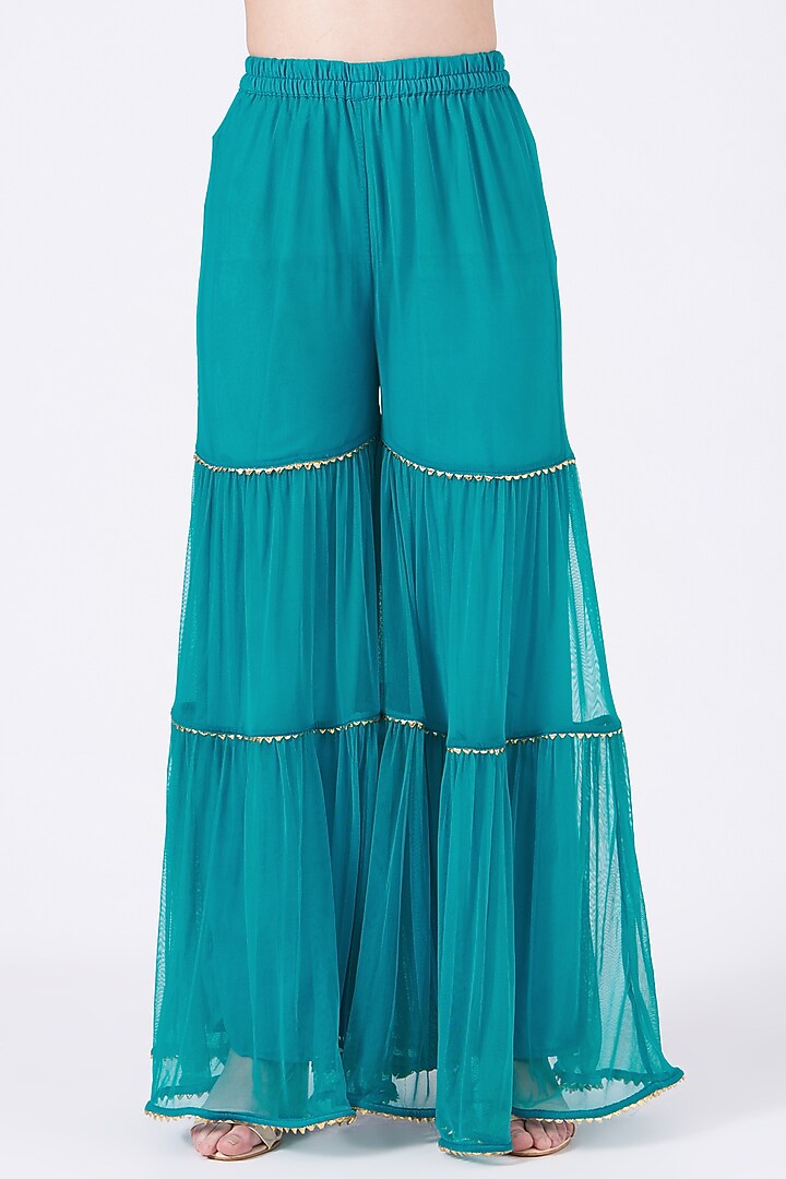 Turquoise Net Layered Gharara Set by Poshak apparels at Pernia's Pop Up Shop