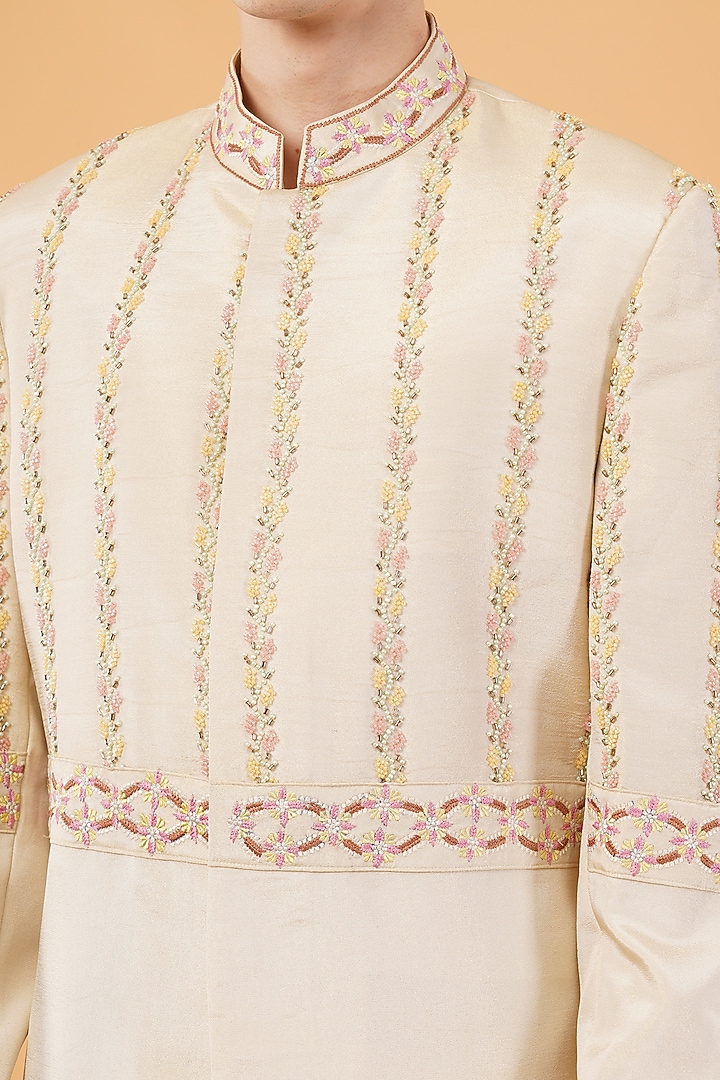 Ivory Silk Hand & Machine Embroidered Groom Sherwani Set by Pasqo Label at Pernia's Pop Up Shop