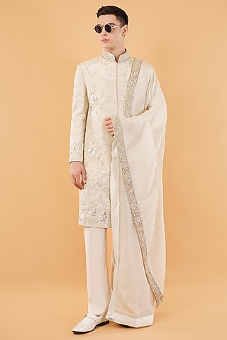 Ivory Silk Hand & Machine Embroidered Sherwani Set by Pasqo Label