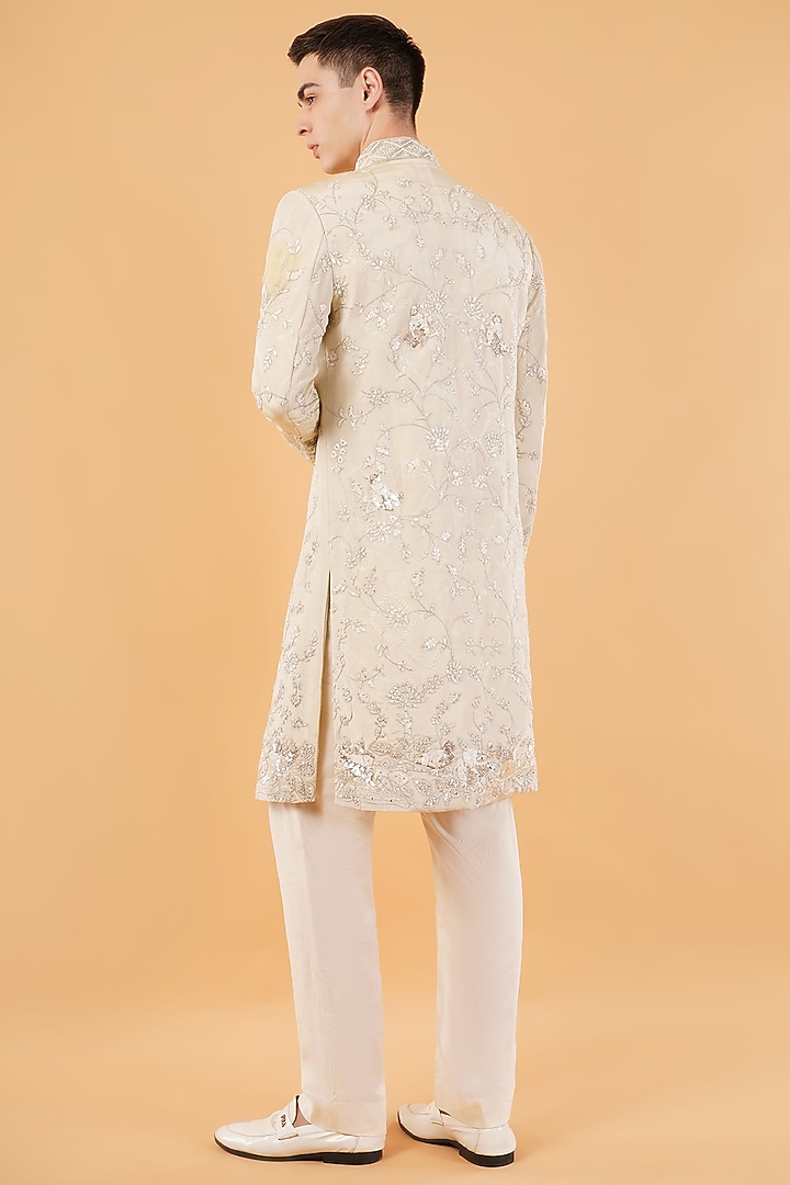Ivory Silk Hand & Machine Embroidered Groom Sherwani Set by Pasqo Label at Pernia's Pop Up Shop