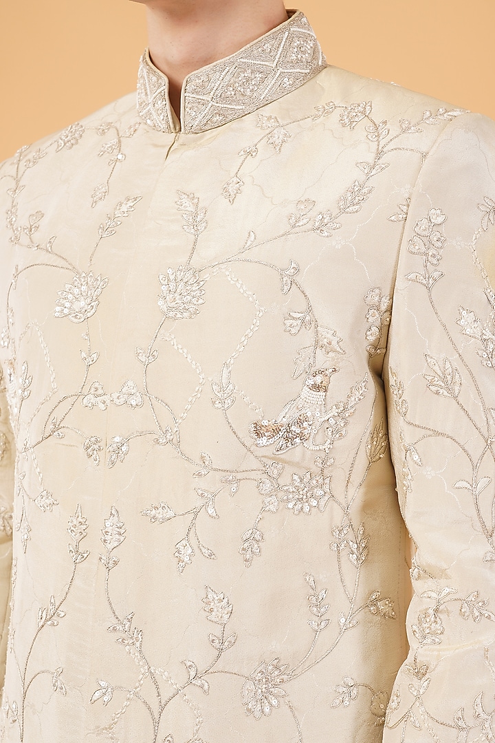 Ivory Silk Hand & Machine Embroidered Groom Sherwani Set by Pasqo Label at Pernia's Pop Up Shop