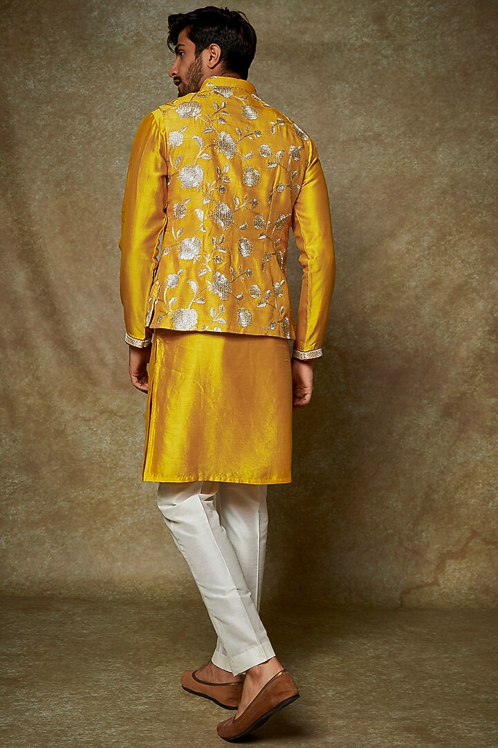 Yellow Dola Silk Embroidered Bundi Jacket Set by PARA at Pernia's Pop Up Shop