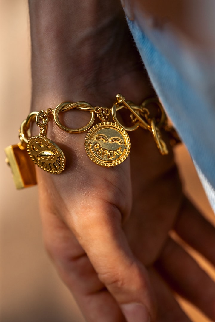 Gold Plated Charm Bracelet by PARISHRI at Pernia's Pop Up Shop