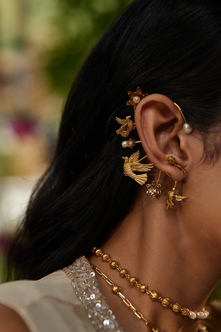 Antique Gold Finish Floral & Bird Motif Mismatch Earcuff by PARISHRI at Pernia's Pop Up Shop